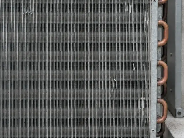 The coil fins on the outside of an air conditioning condenser